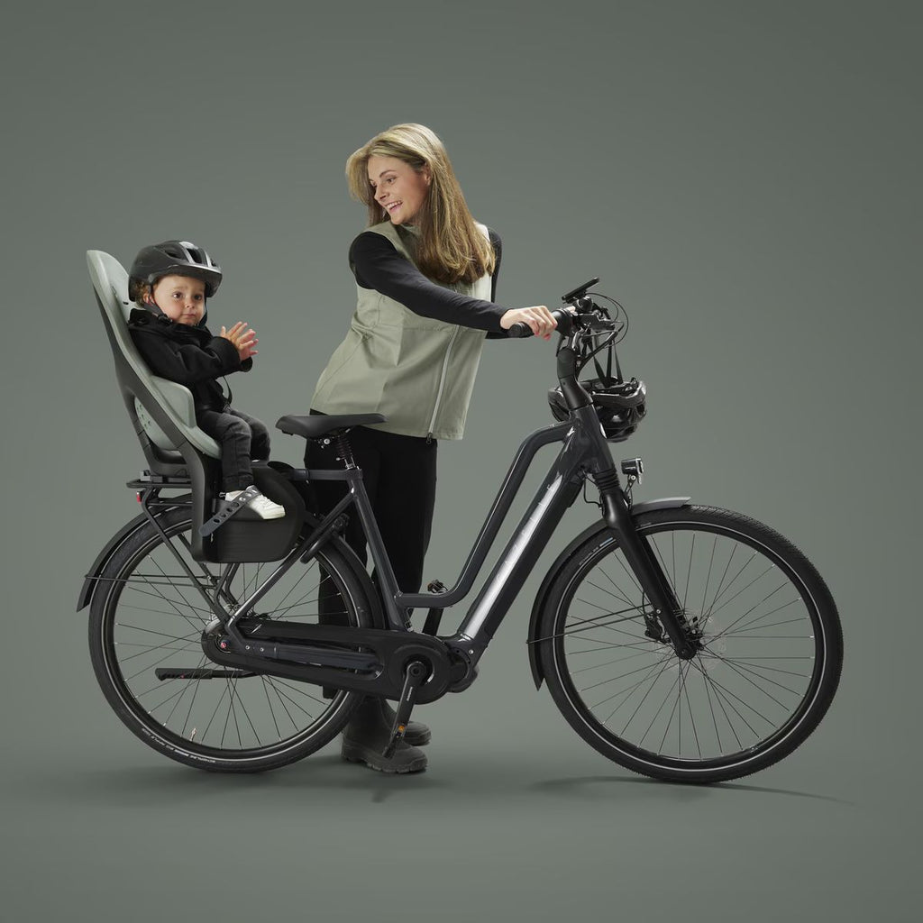 Thule Yepp 2 MIK HD Baby Bike Seat - Black Lifestyle image, mother with baby in child seat